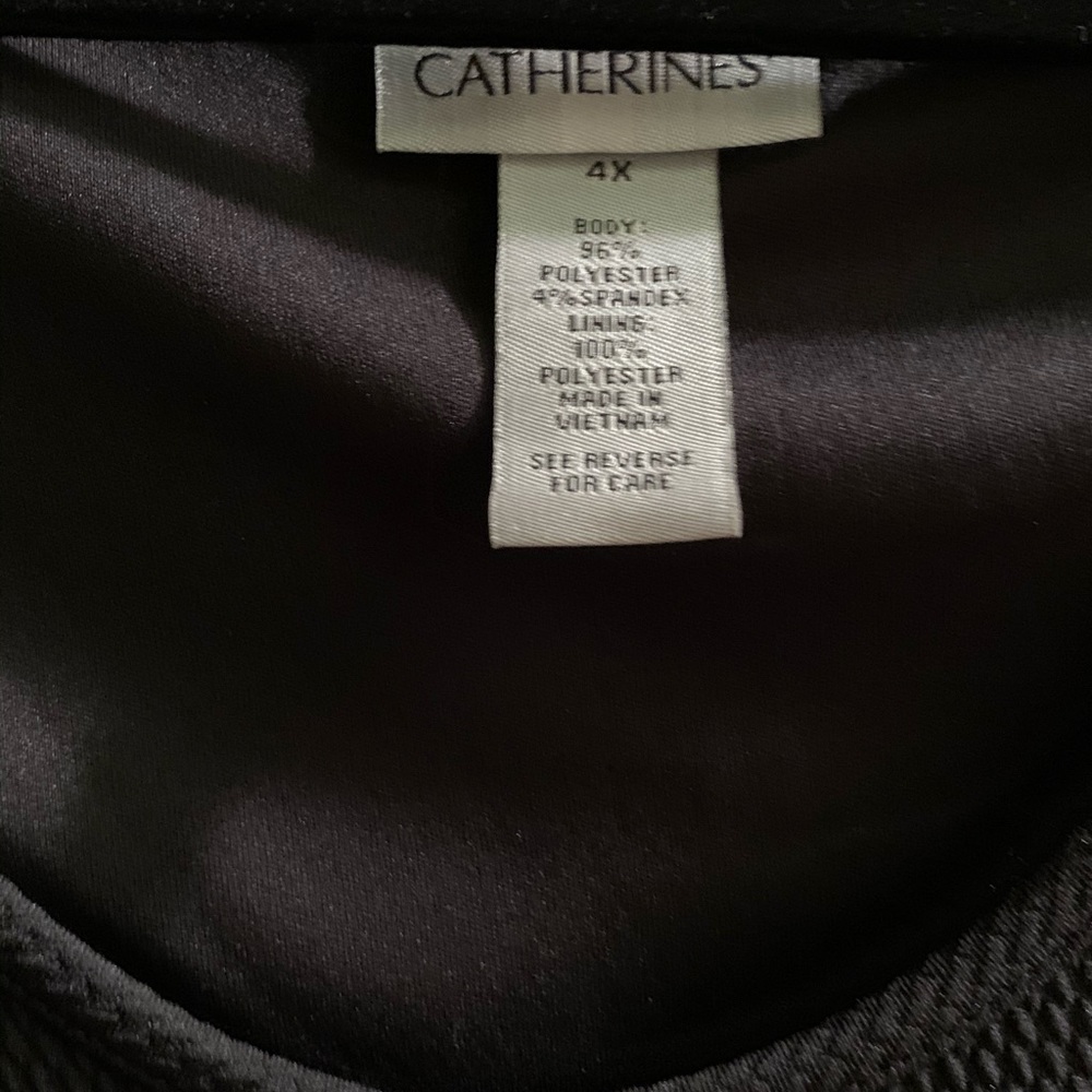 Catherine’s Navy dress with jacket(chevron design). New. Has never been worn.